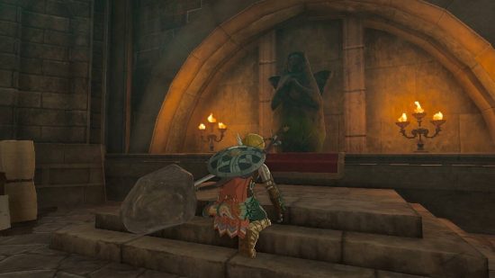 The Legend of Zelda: Tears of the Kingdom Lookout Landing: Link knäböjer framför en gudinnastaty